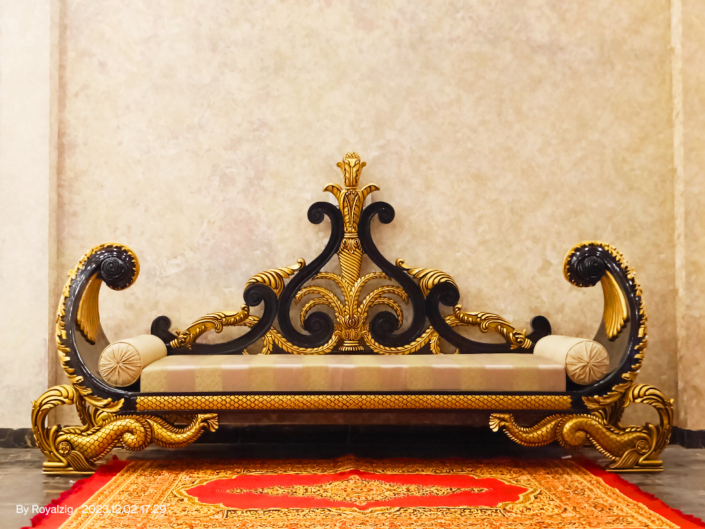 Maharaja Sofa in Artistic Teak Wood Carving with Luxurious Jacquard Fabric - Elegant Royal Golden & Walnut Color Finish - Majestic Crown Design With Handcrafted Mythical Figurine - Carved by Master Artisans of Royalzig Luxury Furniture