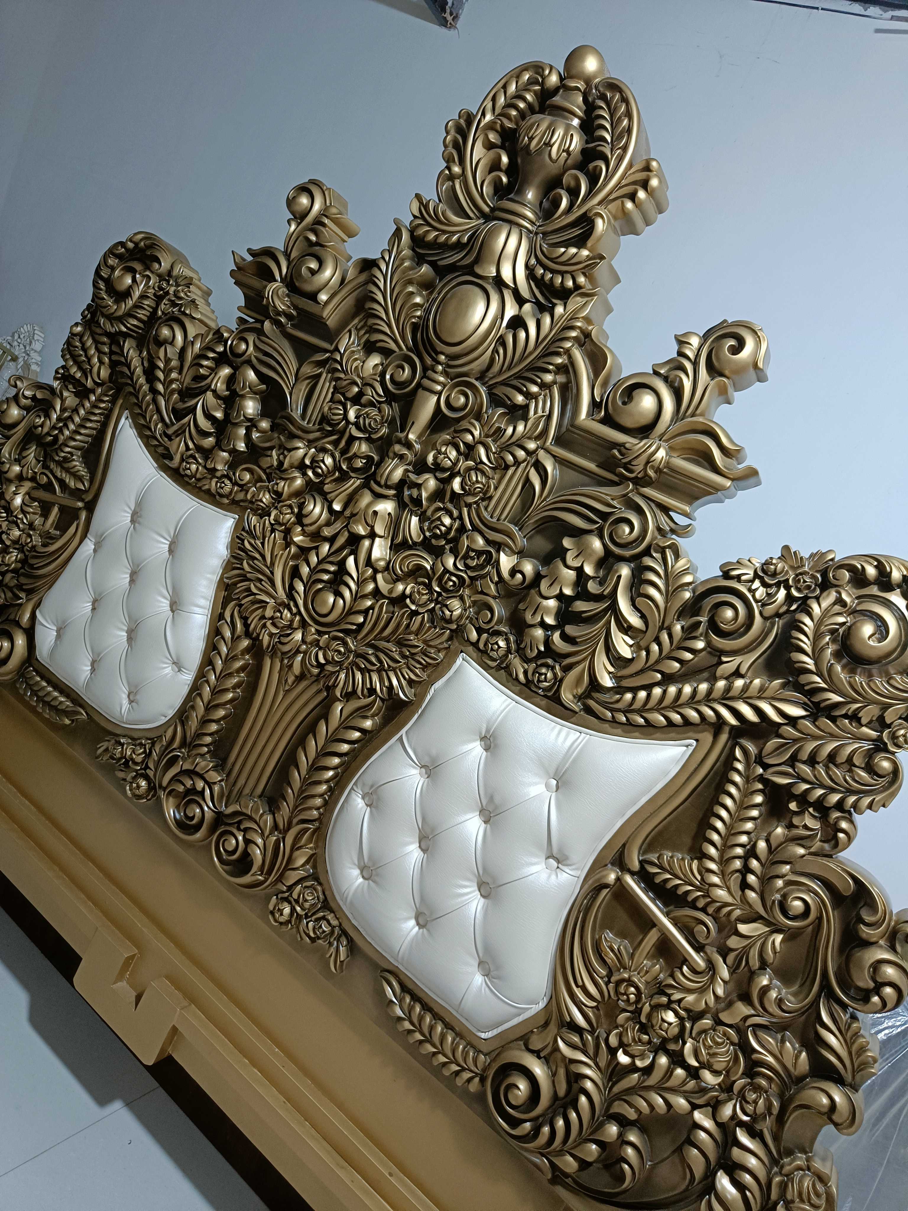 Royal bed Handcrafted maharaja Design made of premium Quality teak Wood - Baroque Style Carving with metallic Gold color and White Tufted Leather - Carved in India Brand Royalzig Luxury Furniture 