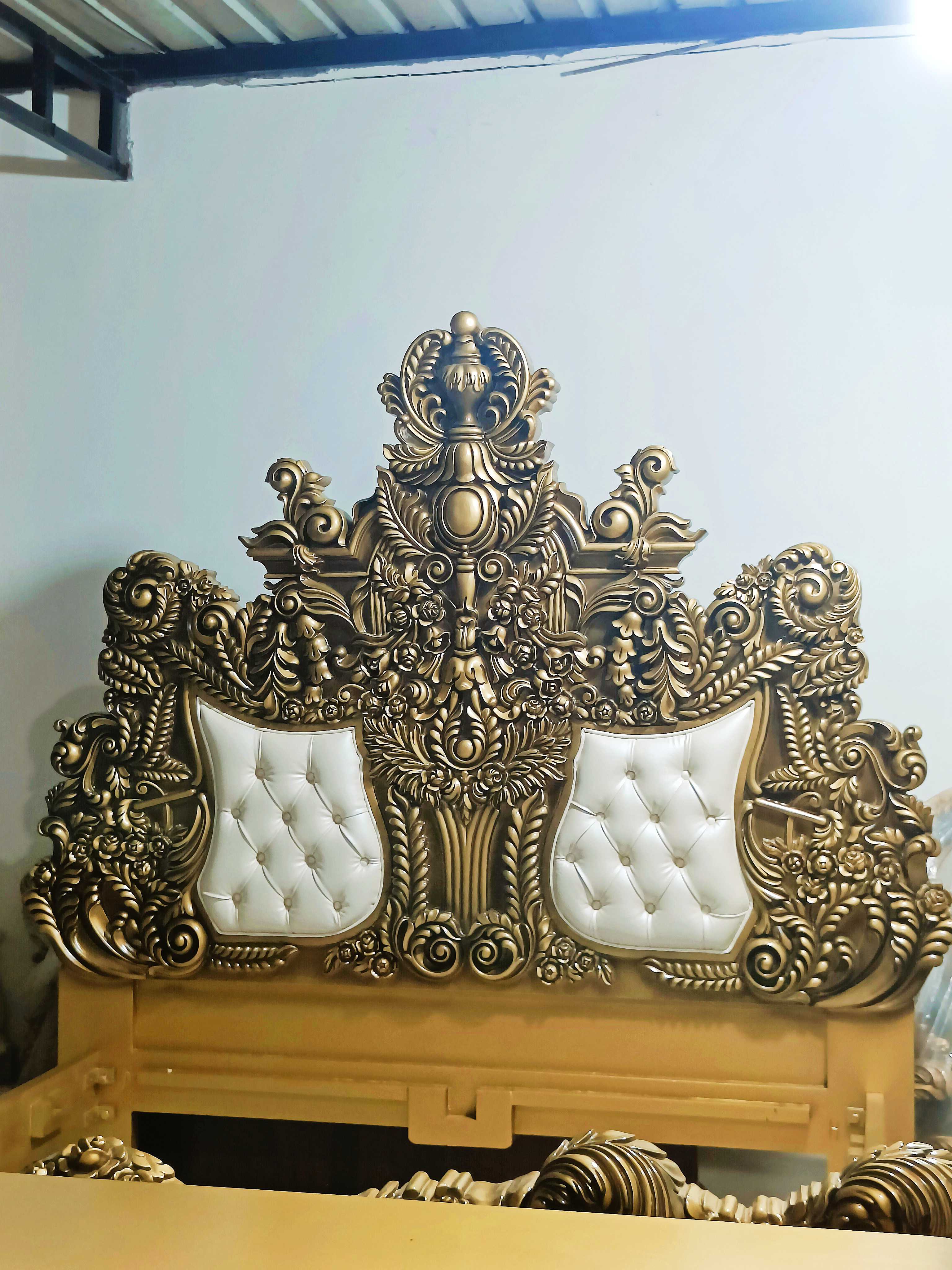 Royal bed Handcrafted maharaja Design made of premium Quality teak Wood - Baroque Style Carving with metallic Gold color and White Tufted Leather - Carved in India Brand Royalzig Luxury Furniture