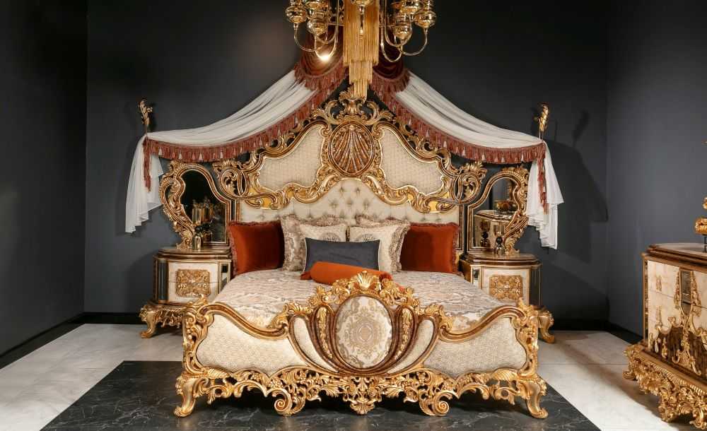Royal Baroque canopy bed with ornate gold frame and upholstered headboard